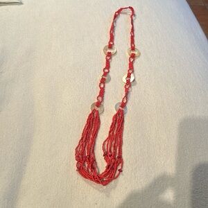 Fashion jewelery necklace red beets beautifully woven together